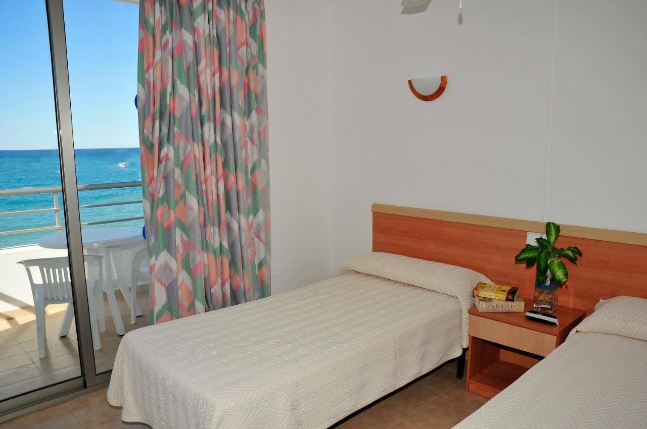 S'Arenal Apartments Portinatx Quarto foto